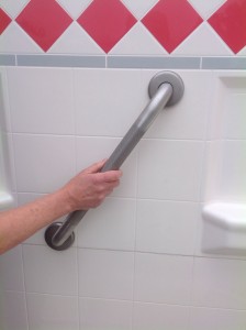 Elcoma Grab Bar installed at an angle in a shower